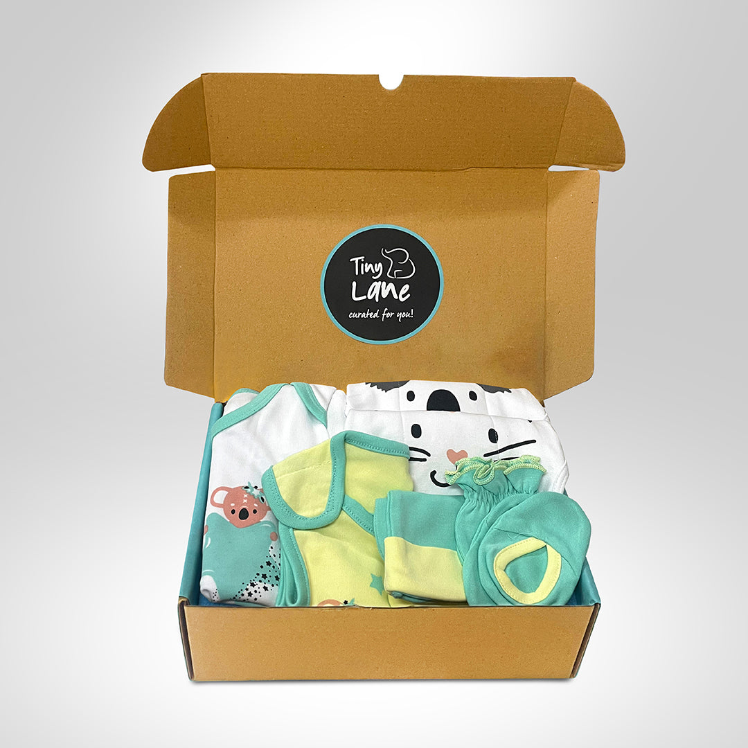 Neonatal Essentials - (set of 7)  variant  1: Onesie - 1kresent koala + 2 Nappy +1 mint green CBM +1 KK bib+ blue Dry mat